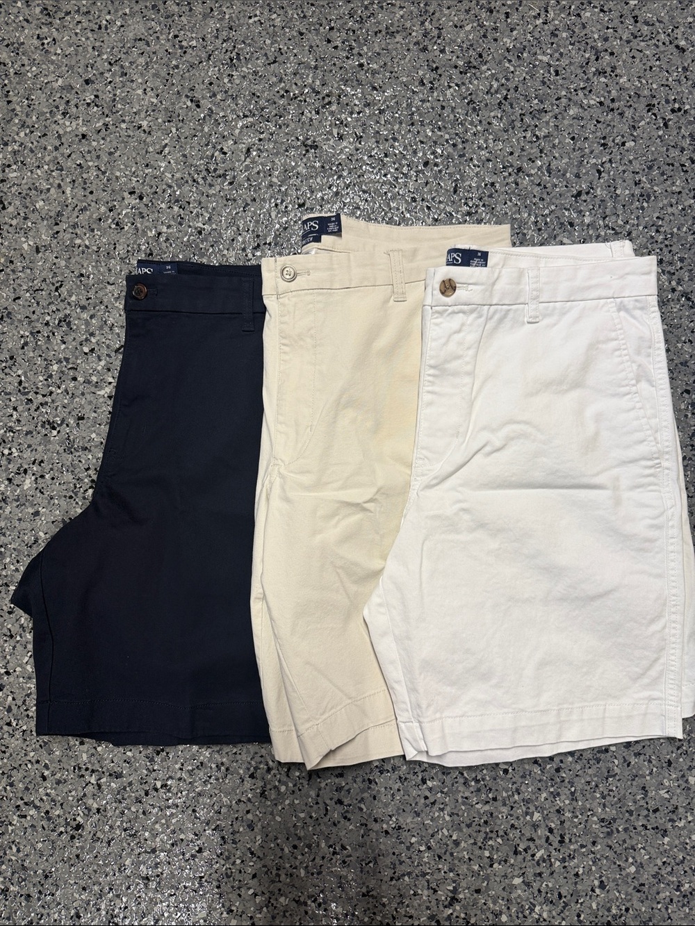 Chaps Men’s Flat Front Shorts in Navy, Cream, and White - 3-Pack